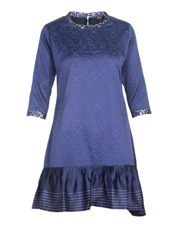 Blue A-line tunic crafted in printed crepe fabric. Embellished with high-low cut frilled hemline and cut & sew on neckline and sleeves opening. 