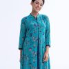 Blue shrug style Tunic in Georgette fabric and inner in Crepe fabric. Designed with a band collar and three-quarter sleeves. Embellished with karchupi at the front. Spliced gather hemline.