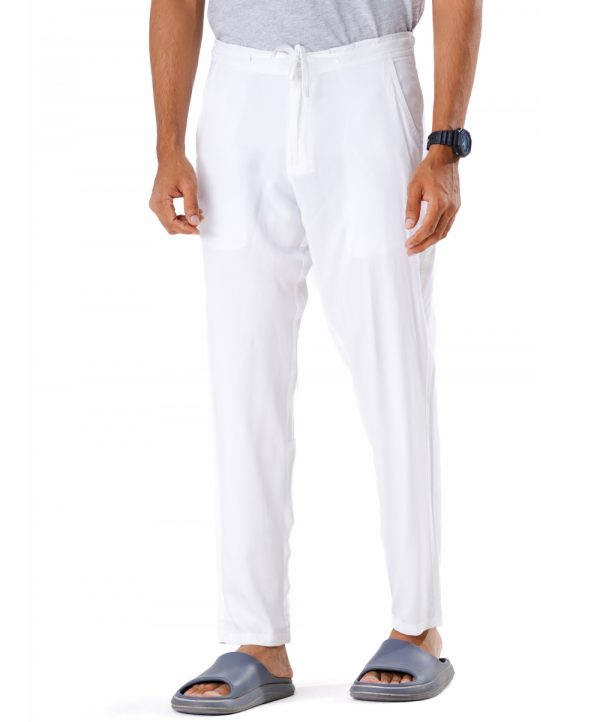 White Premium Pant Pajamas in premium-quality soft Cotton fabric. Five pockets, button fastening with adjustable drawstring on the front & zipper fly.