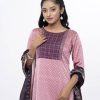 Pink and burgundy all-over printed Salwar Kameez in Crepe fabric. the Kameez is designed with a round neck and three-quarter sleeves. Embellished with embroidered patch attachment at the top front. Complemented by palazzo pants and a half-silk dupatta.