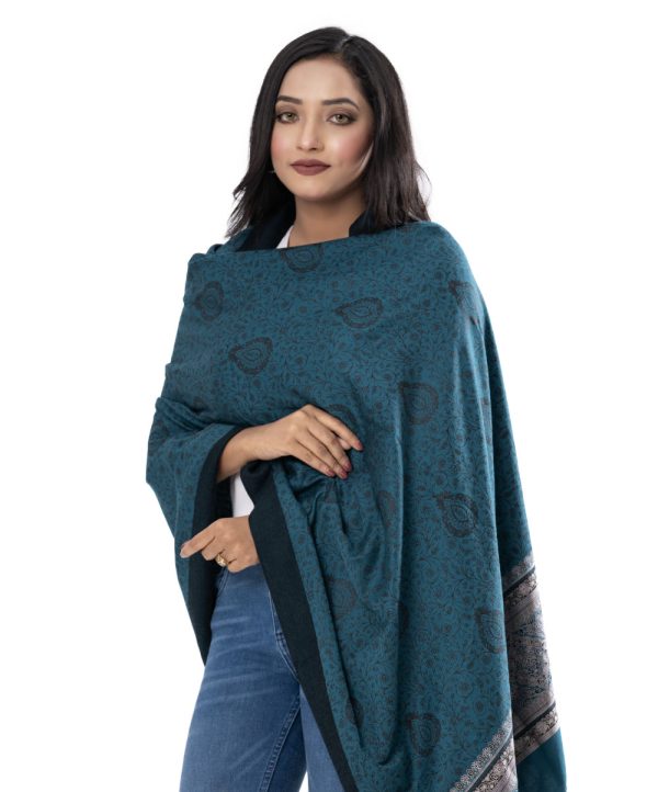 Teal Green all-over printed Shawl in Cotton viscose fabric. Embellished with fringe trim on both.