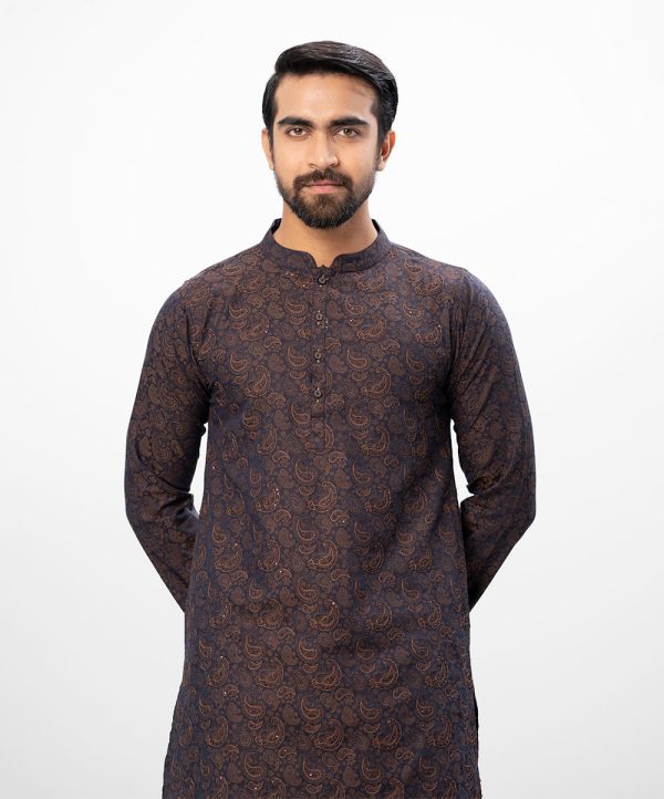 Blue semi-fitted Panjabi in Jacquard Cotton fabric. Designed with a mandarin collar and matching metal buttons on the placket. Embellished with karchupi at the front.