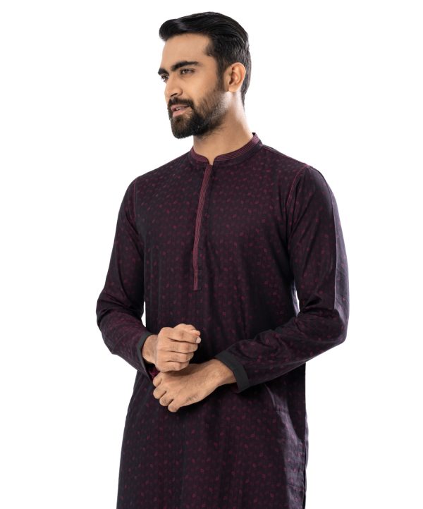 Black semi-fitted Panjabi in Jacquard Cotton fabric. Designed with swing stitches on the collar and hidden button placket.