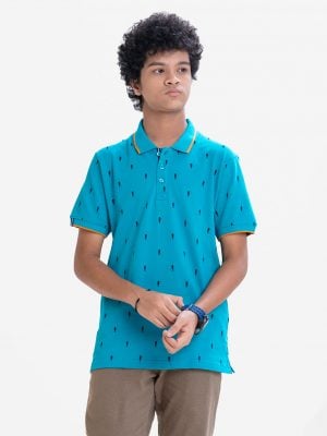 Teen boy short sleeves polo shirt in cotton pique fabric. Classic collar and print attributed.