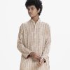 Teen boys printed panjabi in viscose fabric. Mandarin collar with metal button placket and inseam pockets.