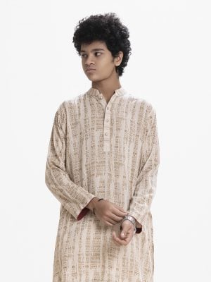 Teen boys printed panjabi in viscose fabric. Mandarin collar with metal button placket and inseam pockets.