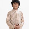 Kid's boys printed panjabi in viscose fabric. Mandarin collar with metal button placket and inseam pockets.