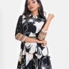 Women's flared style Maxi in printed Georgette fabric. Shirred collar, three-quarter sleeves with lace and patchwork. Tassel ties attach to the waistline.