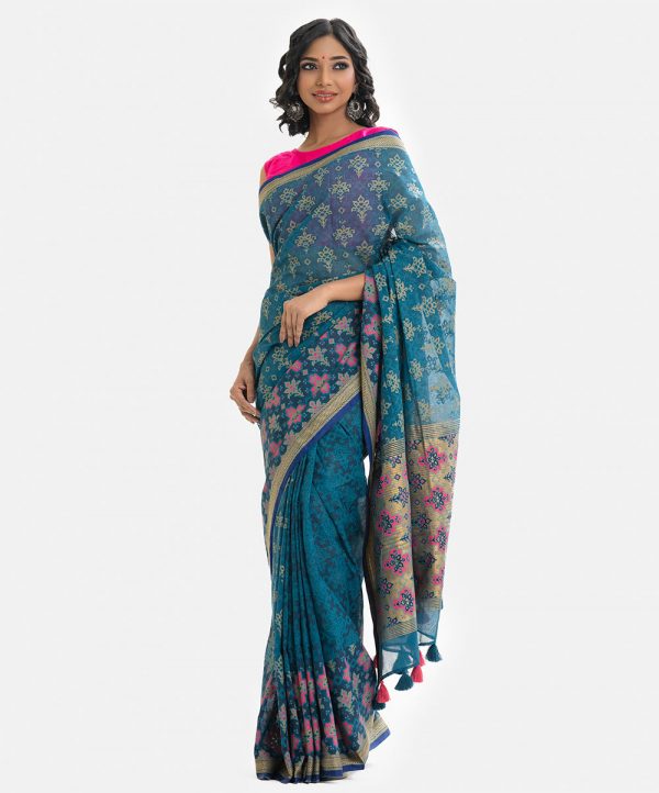 Ethnic printed saree in cotton fabric. Fringe trim at the border of anchal.