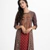 Printed three-quarter sleeved tunic with shrug in crepe fabric. Round Neck, karchupi at the front and hemline.