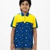 Kid boy polo shirt in cotton pique fabric. Classic collar, short sleeves and all over printed.