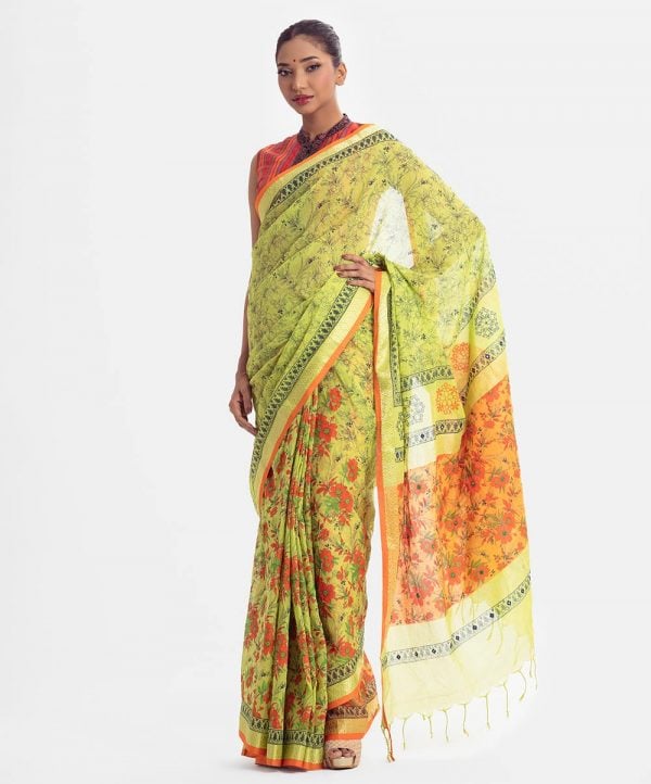 All-over printed saree in cotton fabric. Embellished with embroidery, and fringe trim at the border of anchal.