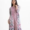 Women's frock style long tunic in floral printed georgette fabric. Band collar, three-quarter cuff sleeves. Patch and karchupi at front.