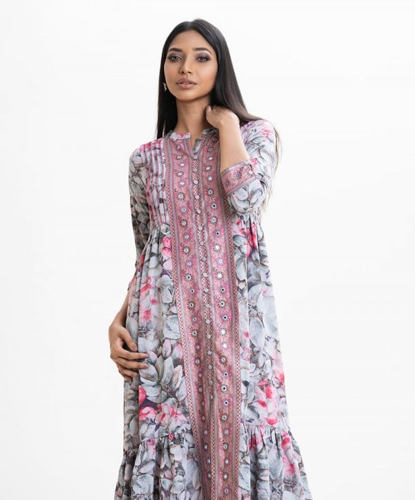 Women's frock style long tunic in floral printed georgette fabric. Band collar, three-quarter cuff sleeves. Patch and karchupi at front.