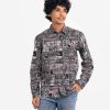 Teen boys printed long-sleeve shirt in cotton fabric. Classic collar, Button fastening and a front pocket.