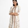 Women's floral printed shrug style kameez in blended cotton fabric. Round neck and three-quarter sleeves. Lace and patch at front and sleeves.