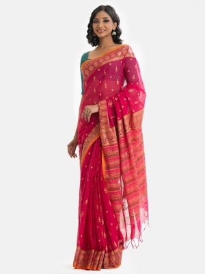 Printed saree in cotton fabric. Embellished with embroidery, and fringe trim at the border of anchal.