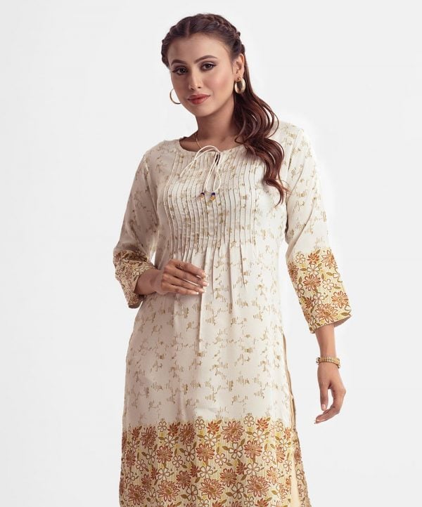 Printed A-line kameez in crepe fabric. Stand collar, three-quarter sleeved and karchupi at the button placket.