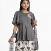 Teen girl's skrit top set in crepe and georgette fabric. Round neck, butterfly-sleeved peplum-style top. Embroidery and karchupi at the top front. Complemented with tiered skirt and tie-dye printed chiffon dupatta.