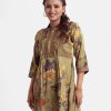 Floral A-line tunic in printed georgette fabric. Stand collar, three-quarter sleeved. Diamond pintuck and attached patch at the top front and hemline.