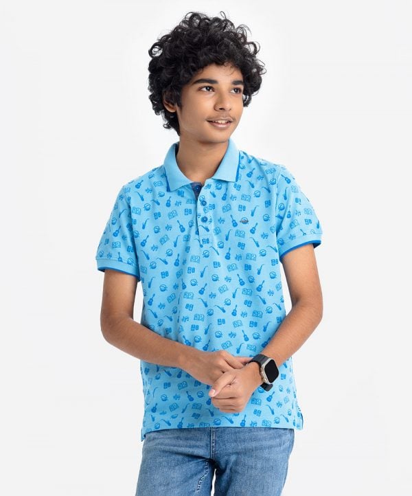 Teen boy's musical equipment printed polo shirt in stretched cotton knit fabric. Classic collar, short sleeves and a straight-cut hem.