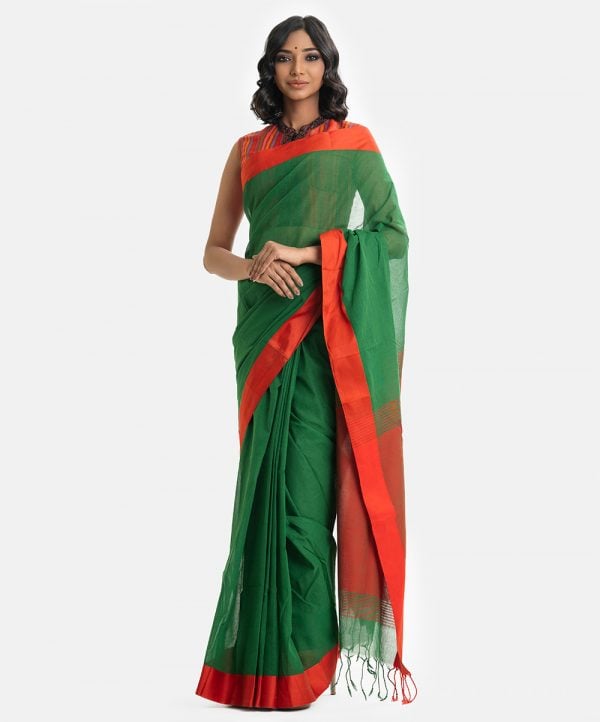 Green saree with Red par in cotton fabric. Fringe trim at the border of anchal.