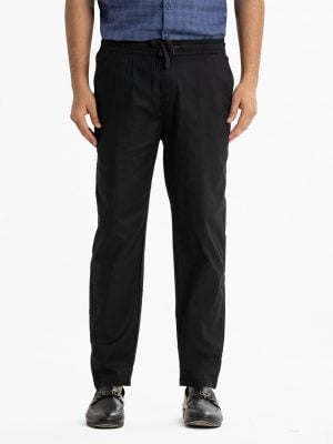 Men's Aligor pajamas in blended cotton fabric. Elastic waisted, drawstring, inseam side pockets and a back pocket.