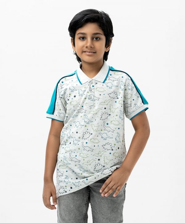 Kids boy Polo Shirt in cotton pique fabric. Classic collar, short sleeves and all over animal printed.