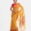 All-over printed saree in blended cotton fabric. Fringe trim at the border of anchal.