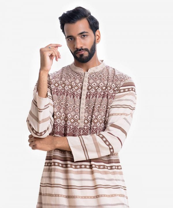 Men's geometric printed semi-fitted panjabi in viscose fabric. Mandarin collar with hidden button placket. Inseam side pockets.