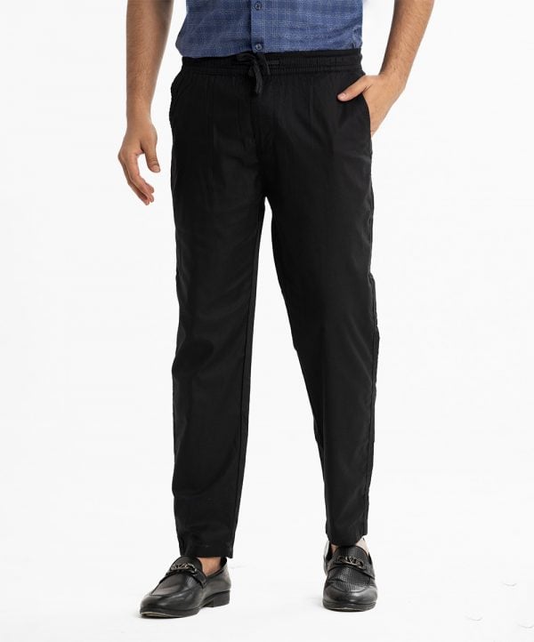 Men's Aligor pajamas in blended cotton fabric. Elastic waisted, drawstring, inseam side pockets and a back pocket.