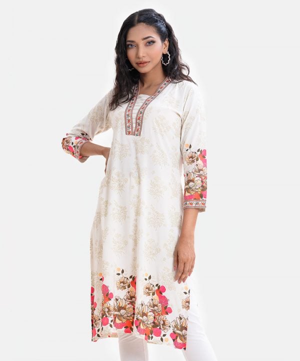 Women's floral printed kameez in viscose fabric. Contrast patch on V-neck with line stitching and three-quarter sleeves.