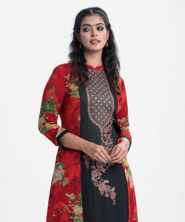 Women's shrug style tunic in printed georgette fabric. Mandarin collar, full sleeves. Karchupi at thr front.