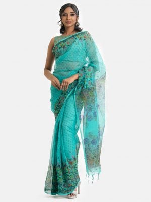 Floral printed saree in cotton fabric. Embellished with embroidery, and fringe trim at the border of anchal.