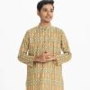 Teen boys panjabi in cotton fabric. Mandarin collar, inseam pockets and button fastening at the front.