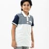 Kid boy polo shirt in cotton pique fabric. Classic collar with button placket and short sleeves.