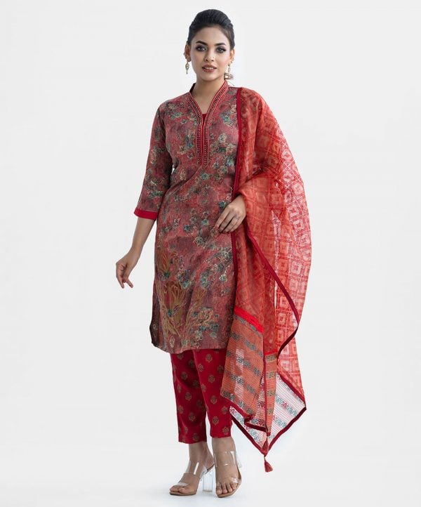 Floral printed exclusive salwar kameez in Muslin & crepe fabric. High neck, three-quarter sleeves and karchupi at the front of kameez. With a muslin dupatta and crepe palazzo pants.