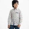 Kid boys vehicle printed long-sleeved shirt in cotton fabric. Classic collar and button fastening at the front.