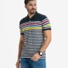 Men's stripes polo shirt in mercerized cotton fabric. Classic collar with button placket and short sleeves.