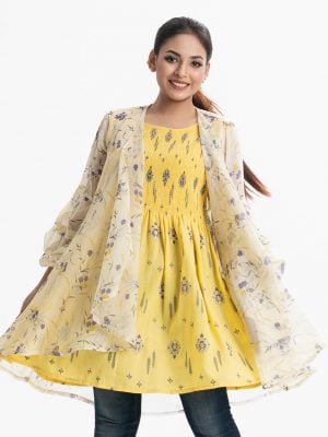 Sleeveless smokey style tunic in georgette fabric with an open front, ballon sleeves shrug in printed georgette fabric.