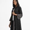 Women's printed long shrug in georgette fabric. Stand collar with single button fastning, bell sleeves.