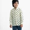 Kid boys vehicle printed long-sleeved shirt in cotton fabric. Classic collar and button fastening at the front.