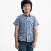 Kid boys printed short-sleeved casual shirt in printed cotton fabric. Classic collar, button fastening at the front.