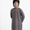 Kid boys panjabi in cotton fabric. Mandarin collar, full-sleeved. Inseam pockets and button fastening at the front.