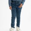 Kid boys long pant in denim fabric. Five pockets and a zipper fly with a metal button.