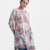 Women's floral printed A-line tunic in blended cotton fabric. Stand collar, three-quarter sleeves. Patchwork at front and hemline.