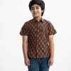 Kid boys short-sleeved casual shirt in printed cotton fabric. Classic collar, a chest pocket and button fastening at the front.