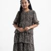 Kid girls tiered style frock in georgette fabric. Round neck, puff-sleeved and smokey at the front.