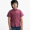 Kid boys printed short-sleeved casual shirt in printed cotton fabric. Classic collar, button fastening at the front.