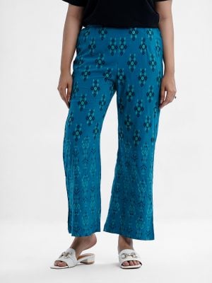 Women's printed palazzo in viscose fabric. Concealed elasticated waistline.